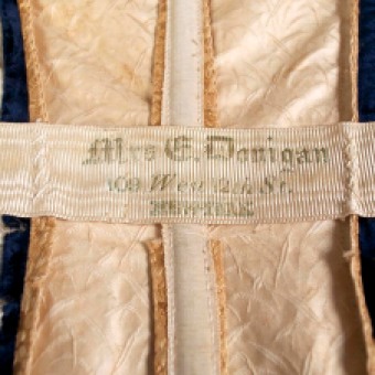 Waistbands of petersham ribbon were common in dress bodices from the 1870s through to the 1910s. While they anchored the waist of the bodice, they also served as a place for the dressmaker to add her name and address.
